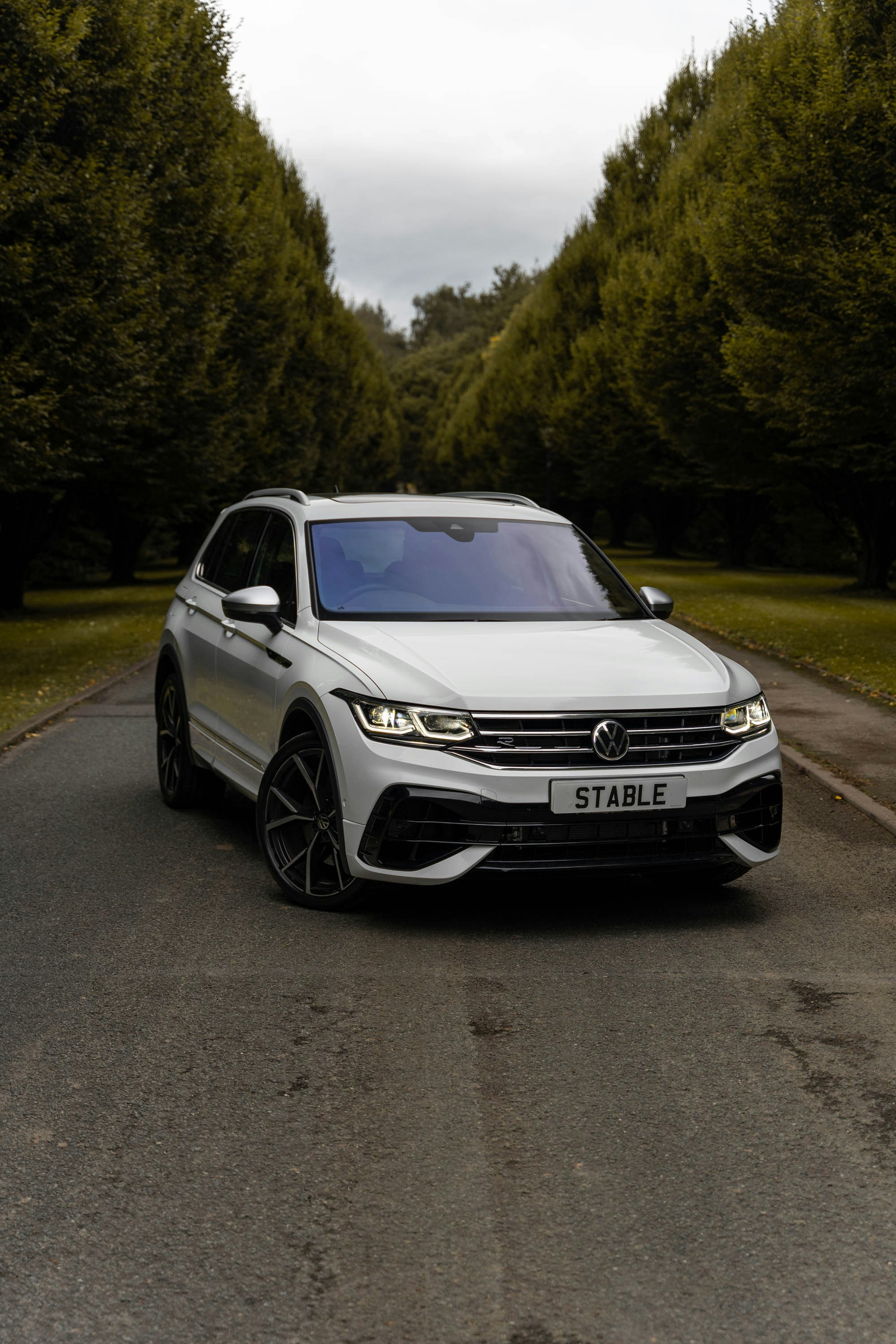 a white car parked on a road
