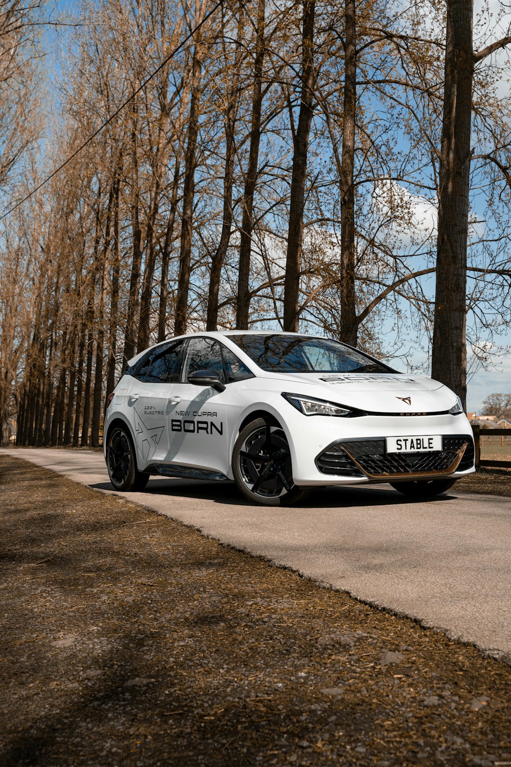 a white car parked on a road