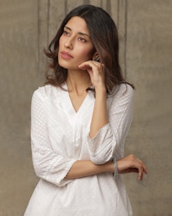 a woman posing for a picture