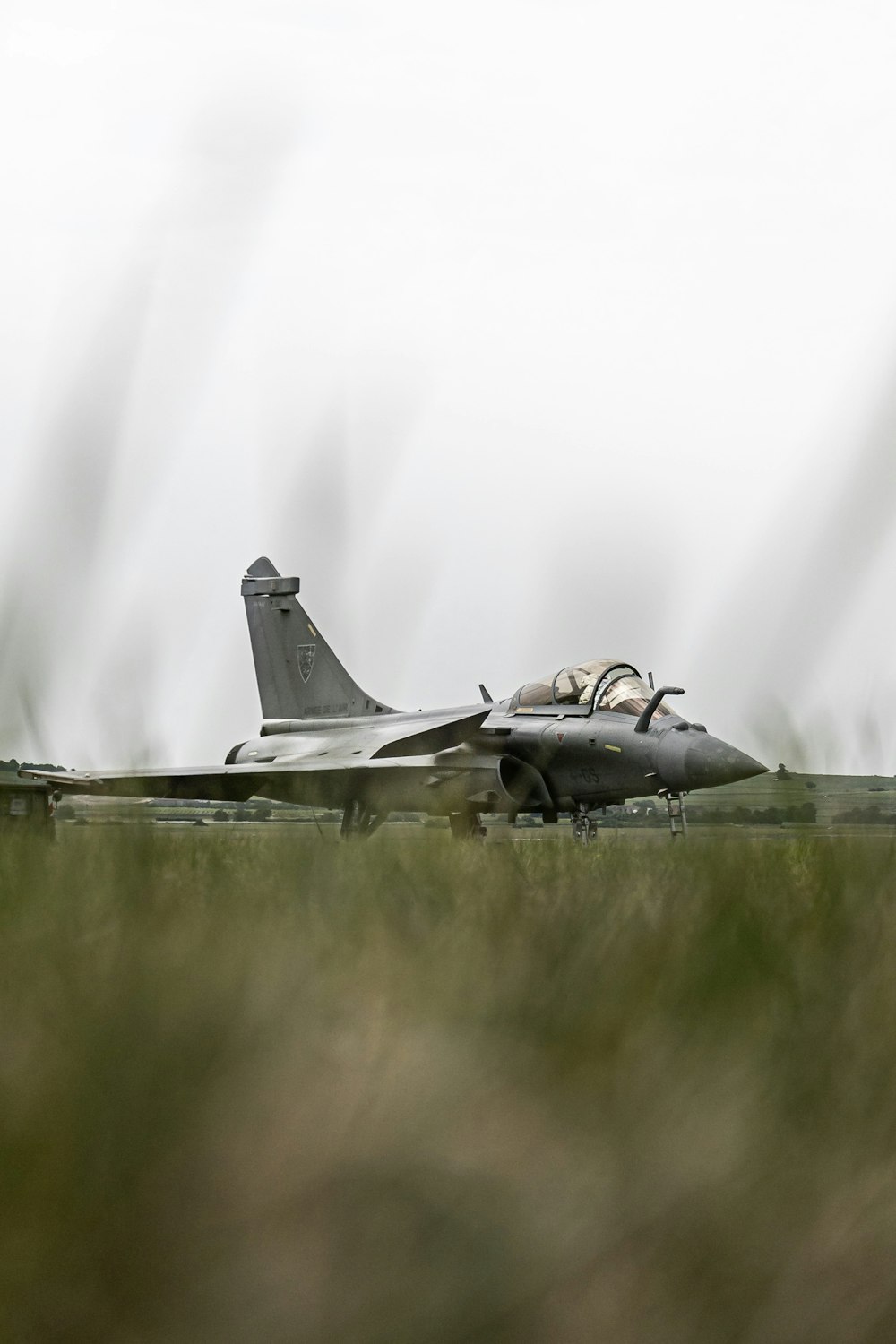 a fighter jet on a runway