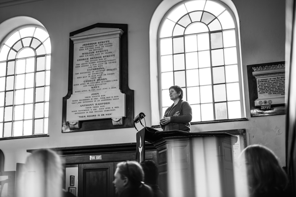 a person standing at a podium