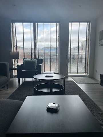 a room with a table and chairs