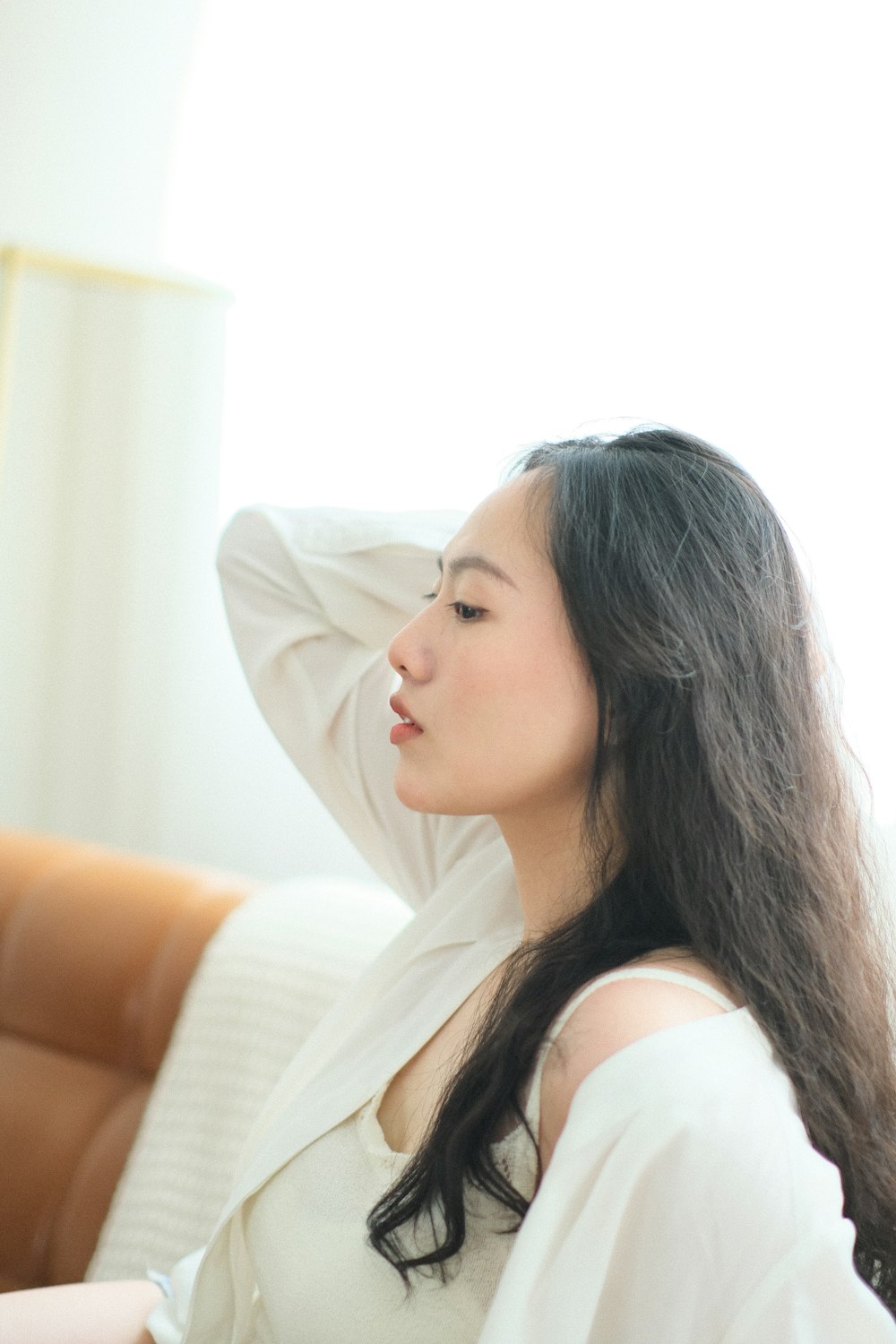 a woman lying on a couch