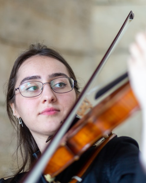 a person playing a violin