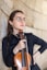 a person playing a violin