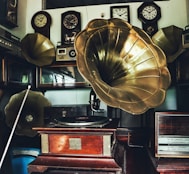 a large brass helmet sits on top of a desk