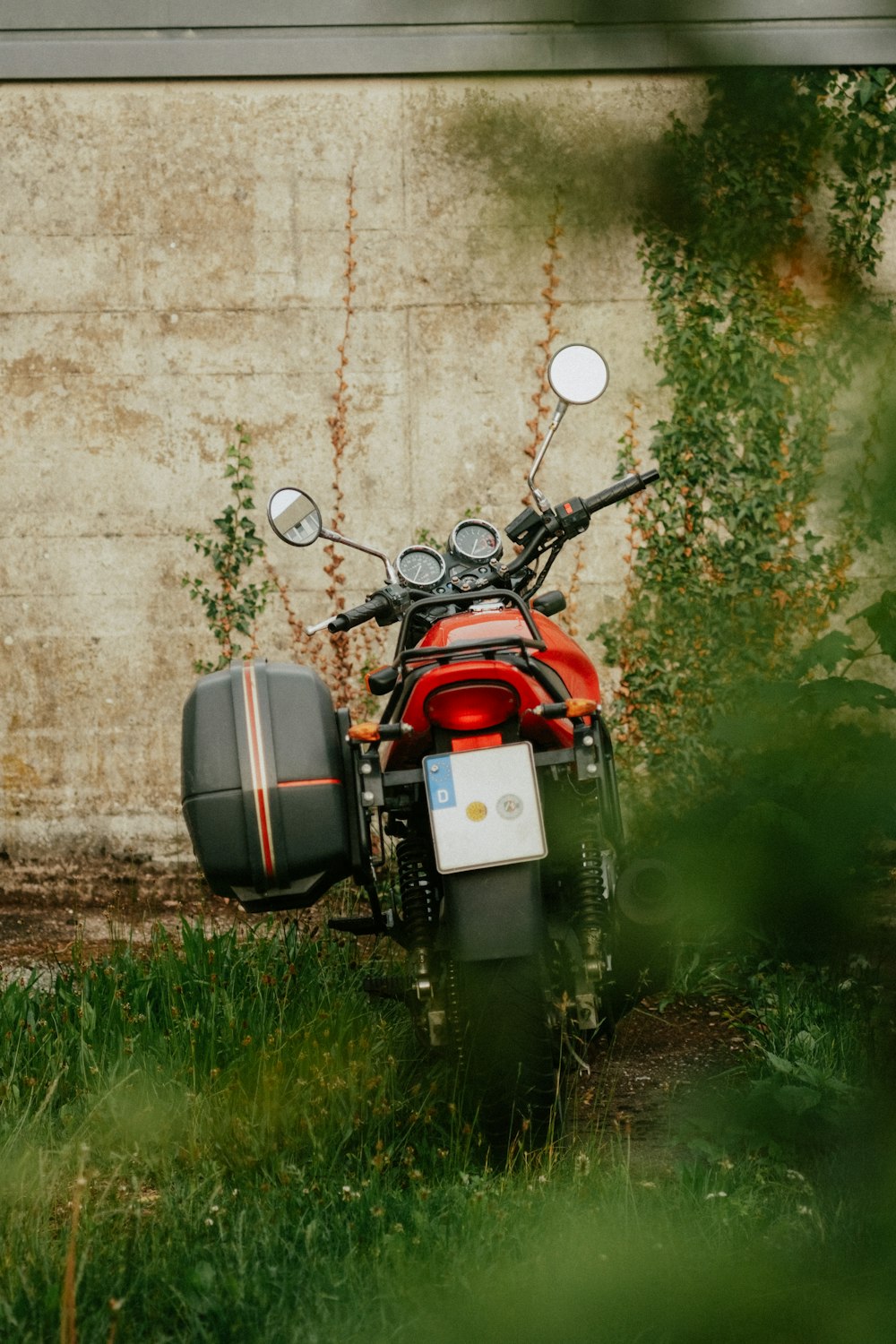 a motorcycle parked in the grass