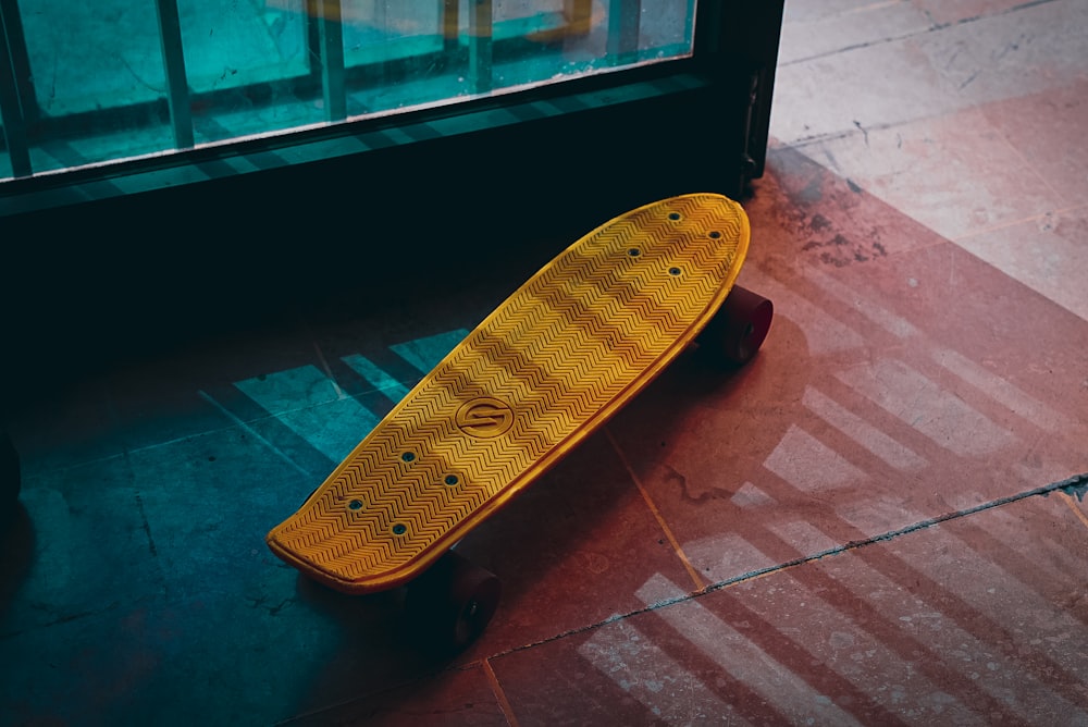 a skateboard on a sidewalk