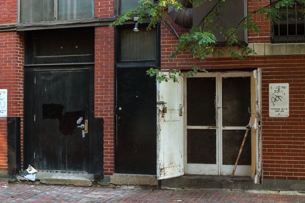 a brick building with two doors