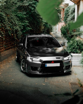 a black car parked on a street