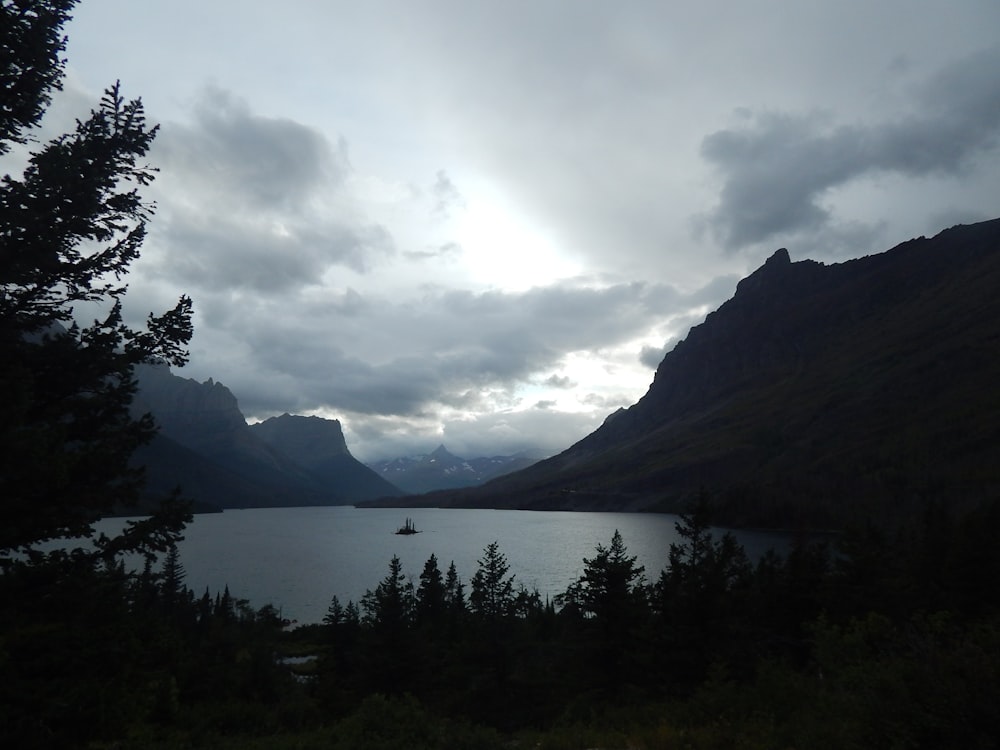 a lake surrounded by mountains