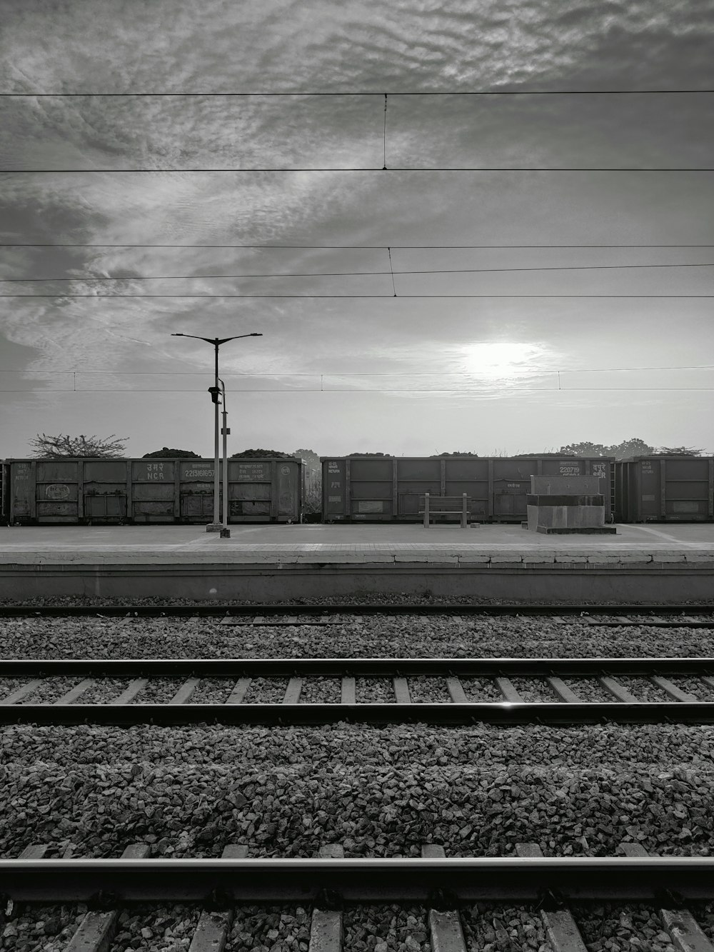 train tracks next to a building