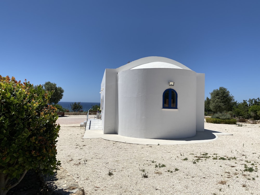 a white building with a blue sky