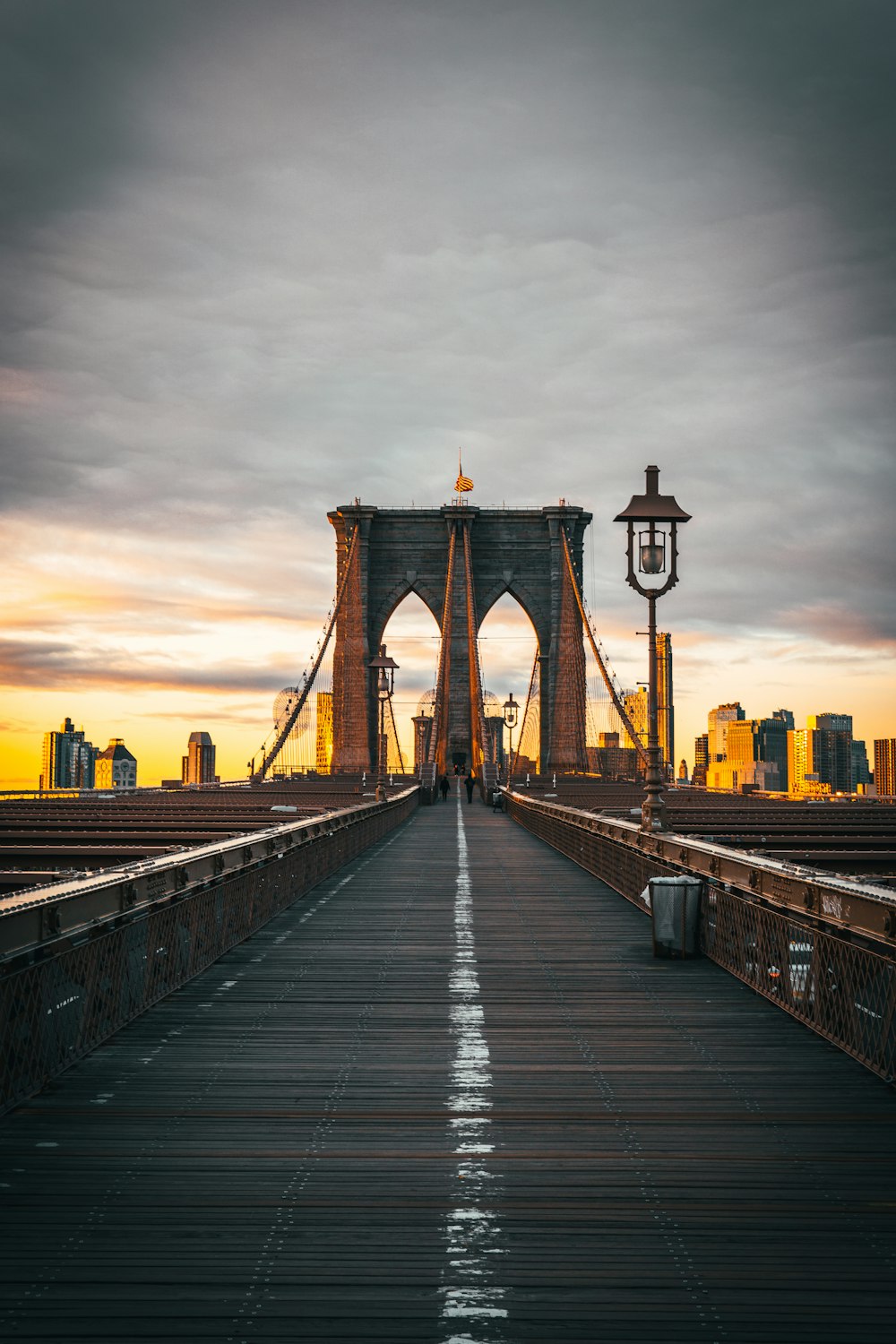 a bridge with a city in the background