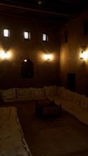 A cozy table set in the restaurant with Afghan decorations.