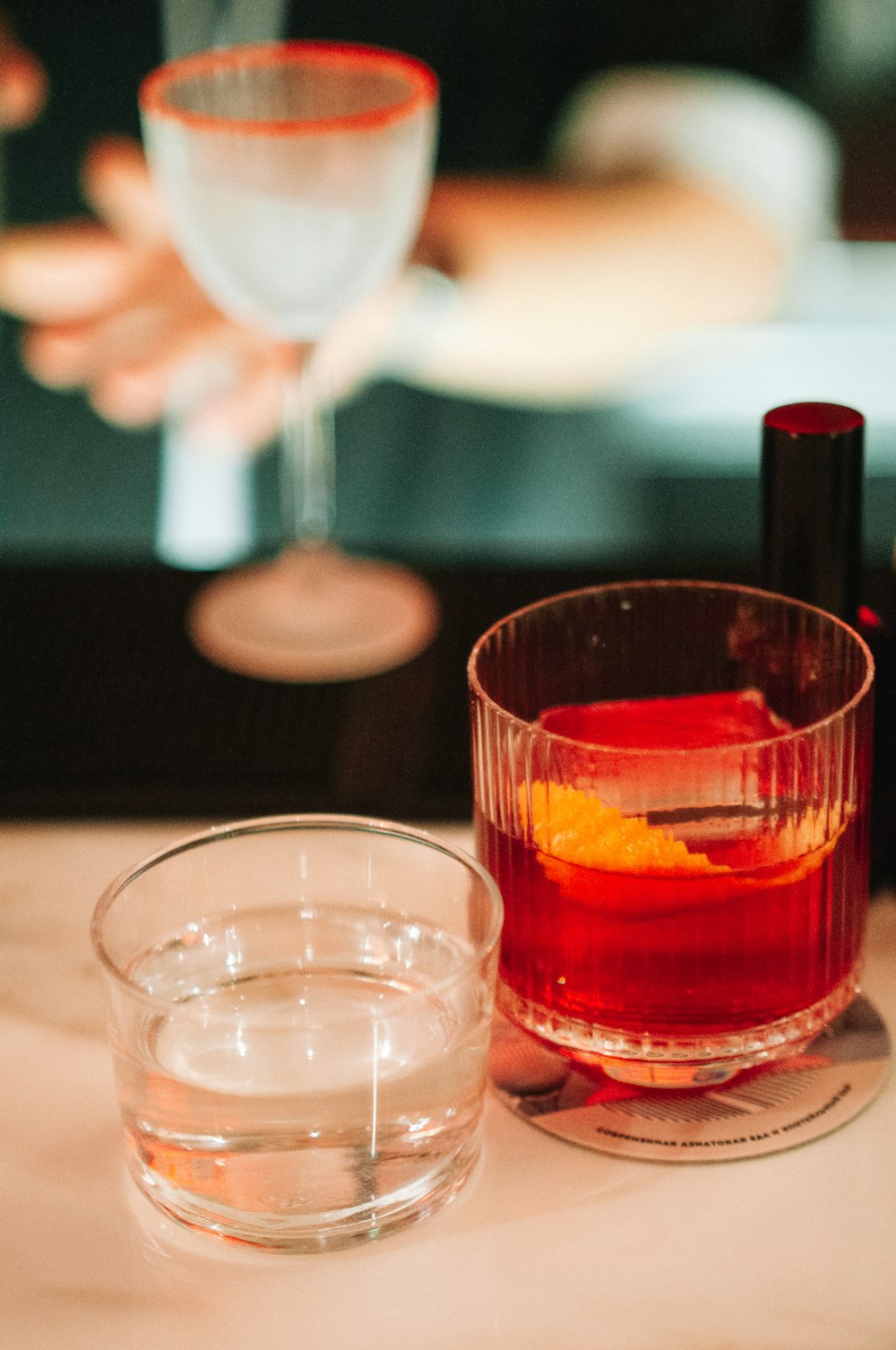 a group of glasses with liquid in them