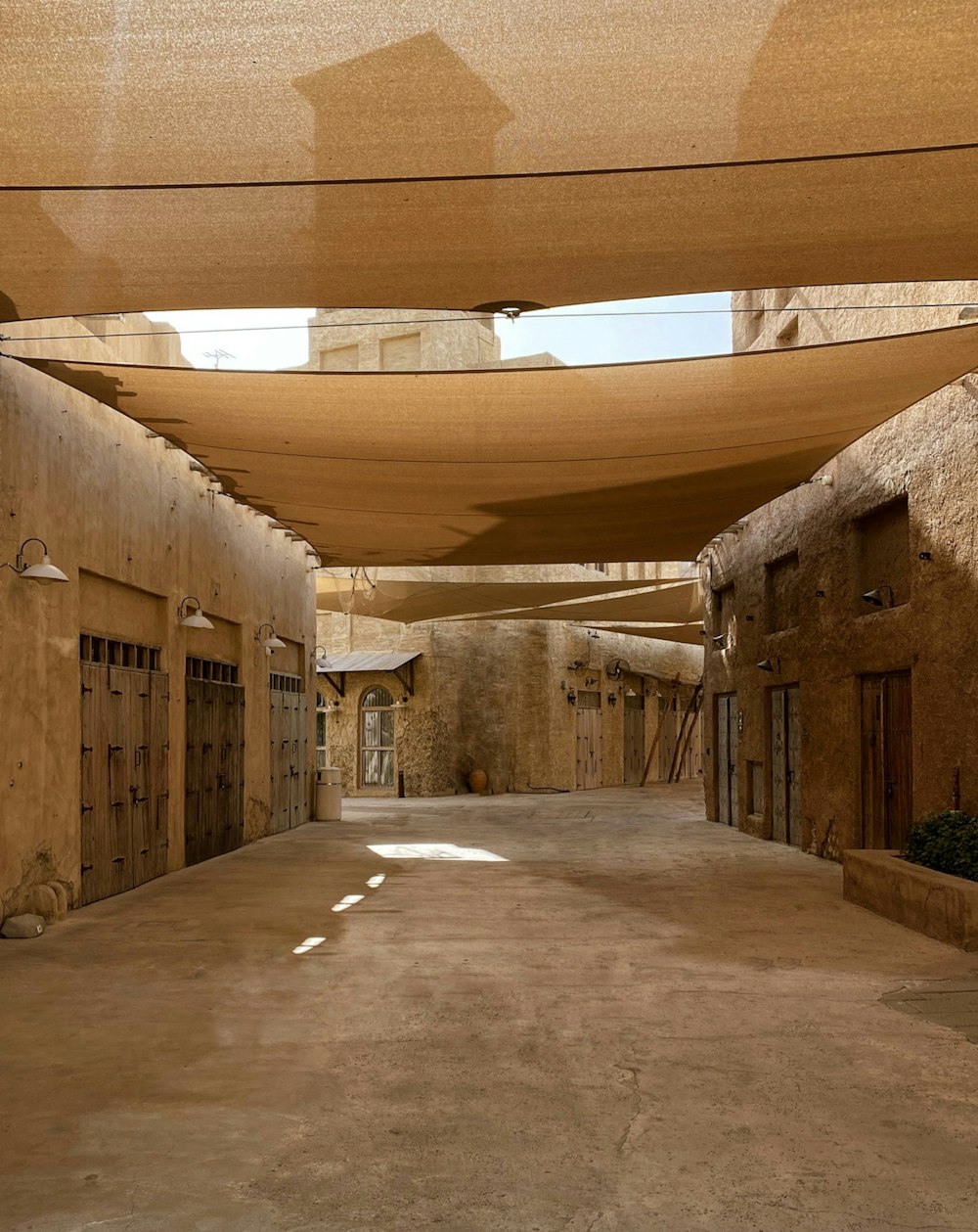 a long hallway with a light on the ceiling