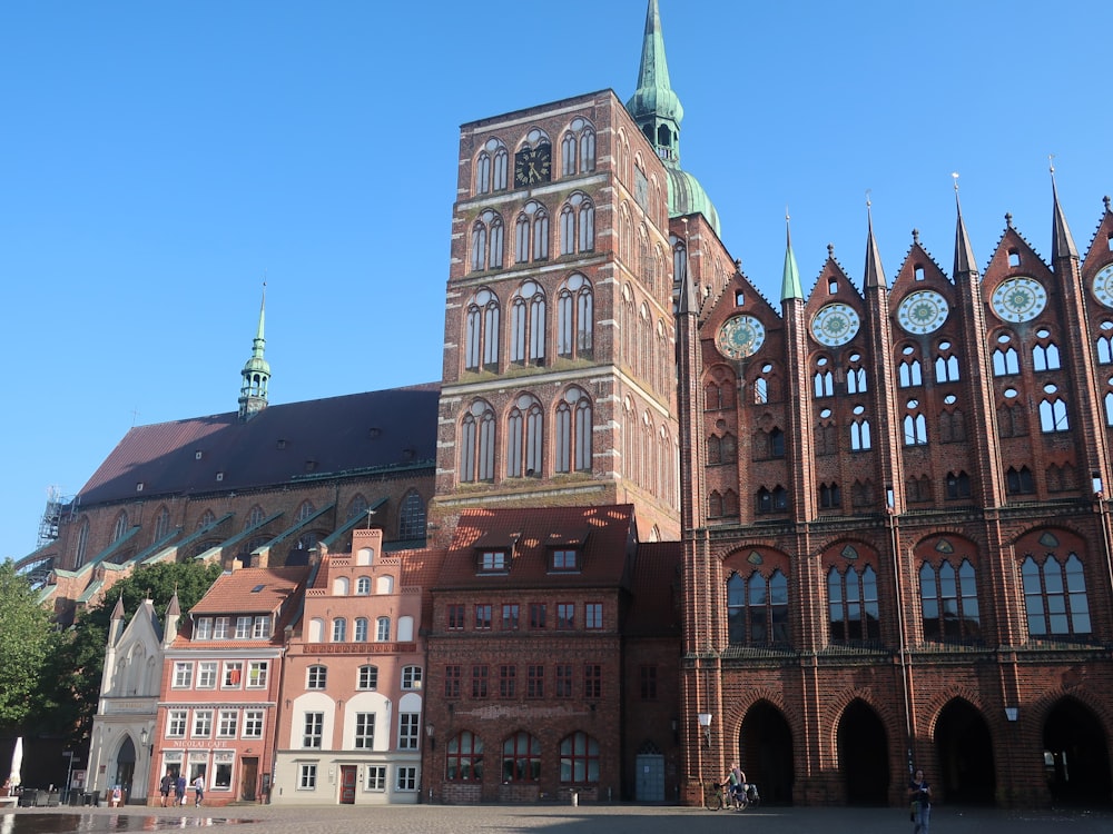 a large brick building with a clock tower