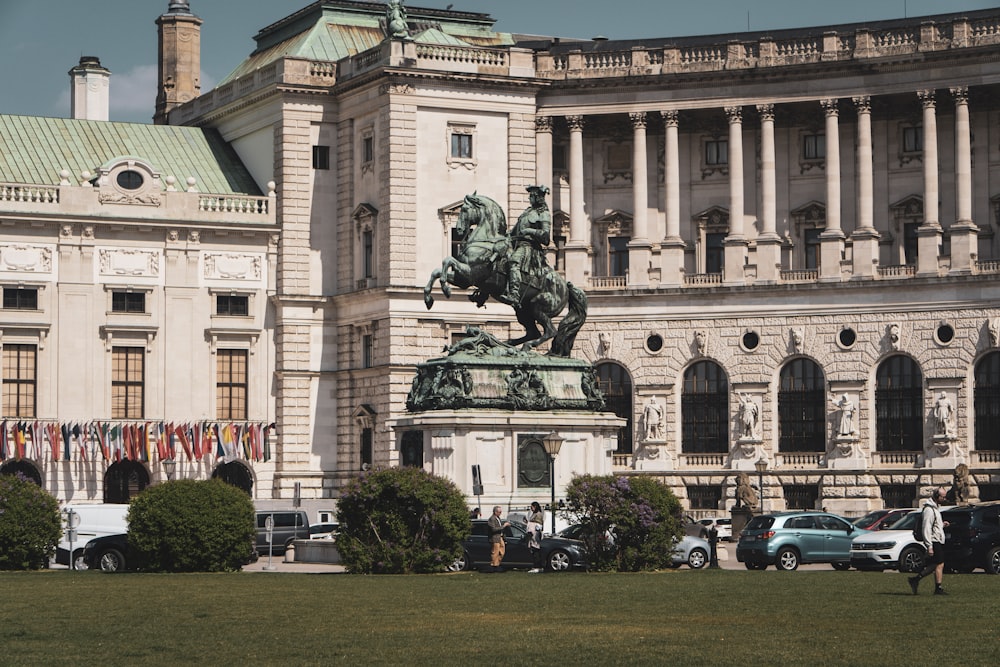 a statue in front of a building