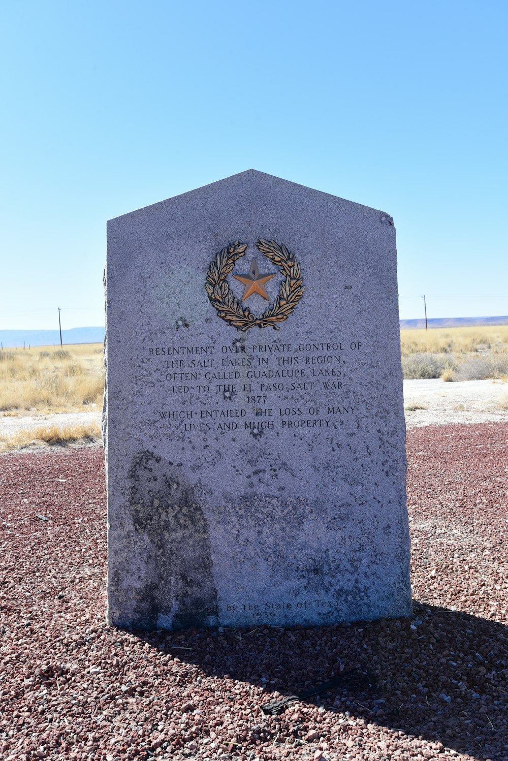a tombstone in a desert