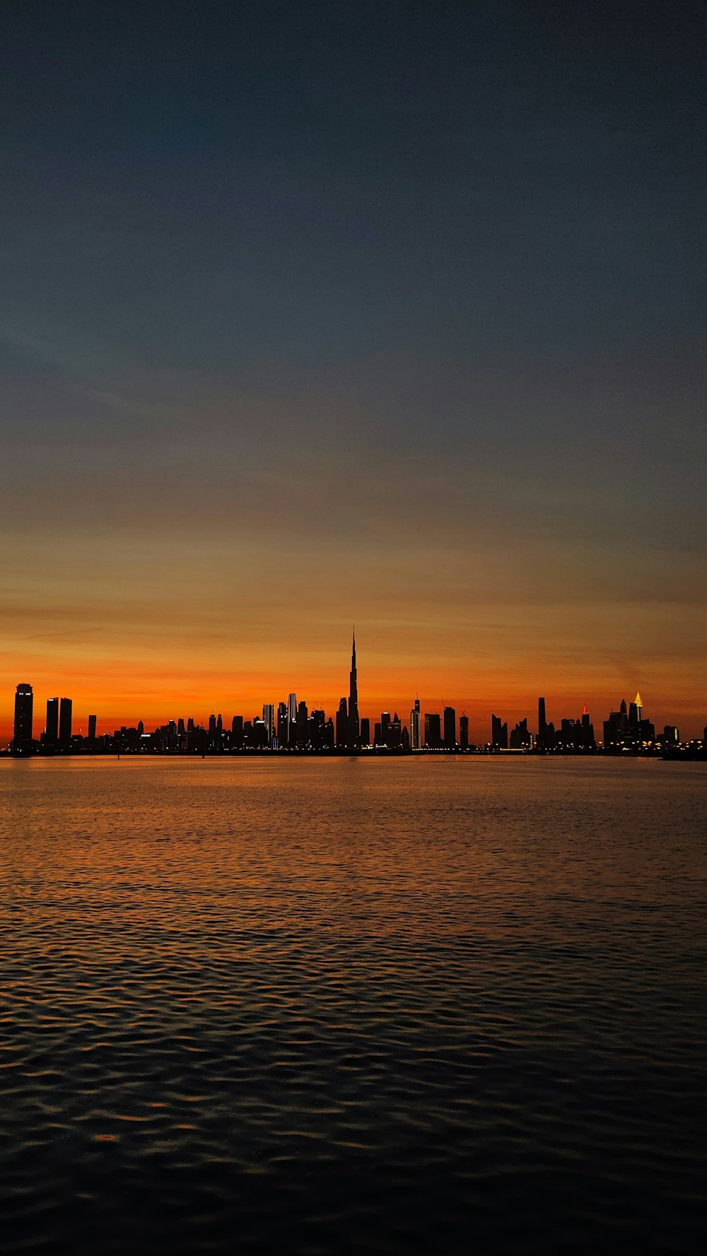 a city skyline at sunset