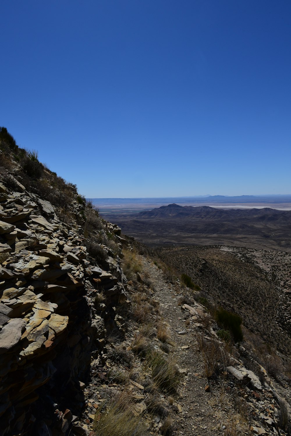 a rocky landscape with a blue sky