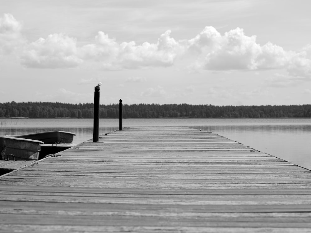 a dock with a row of boats