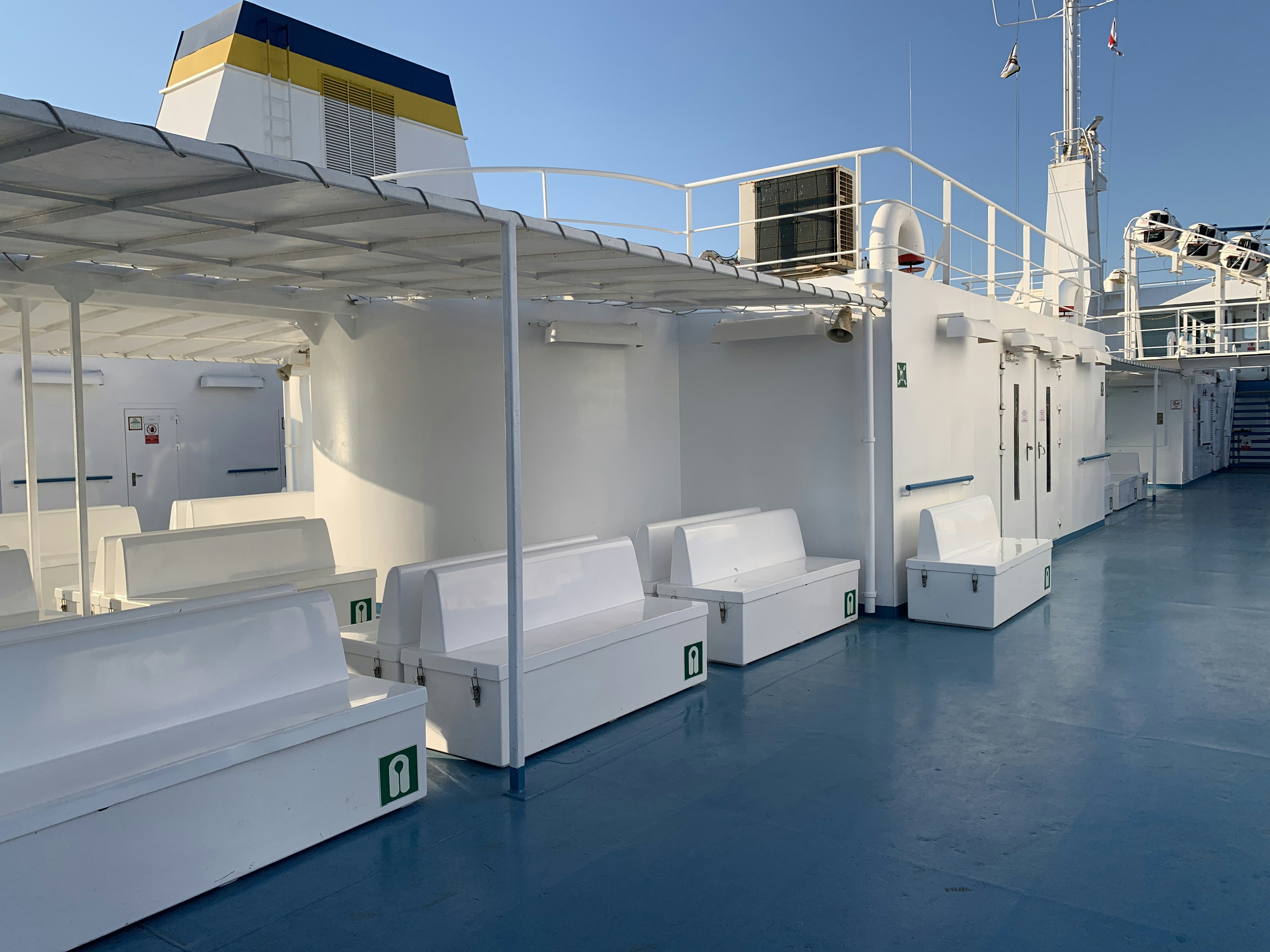 Interior of an electric cargo van showing loading space and shelving