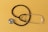 a black stethoscope on a yellow background