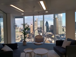 Elegant office space with modern design and city skyline view.