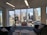 A modern law office with a sleek design and a view of a city skyline.