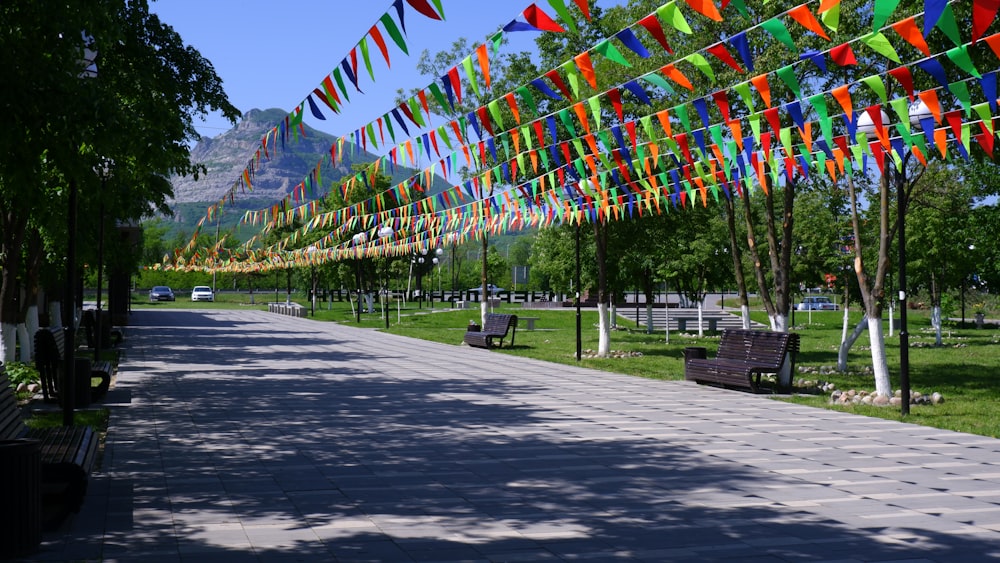 a row of flags on a street