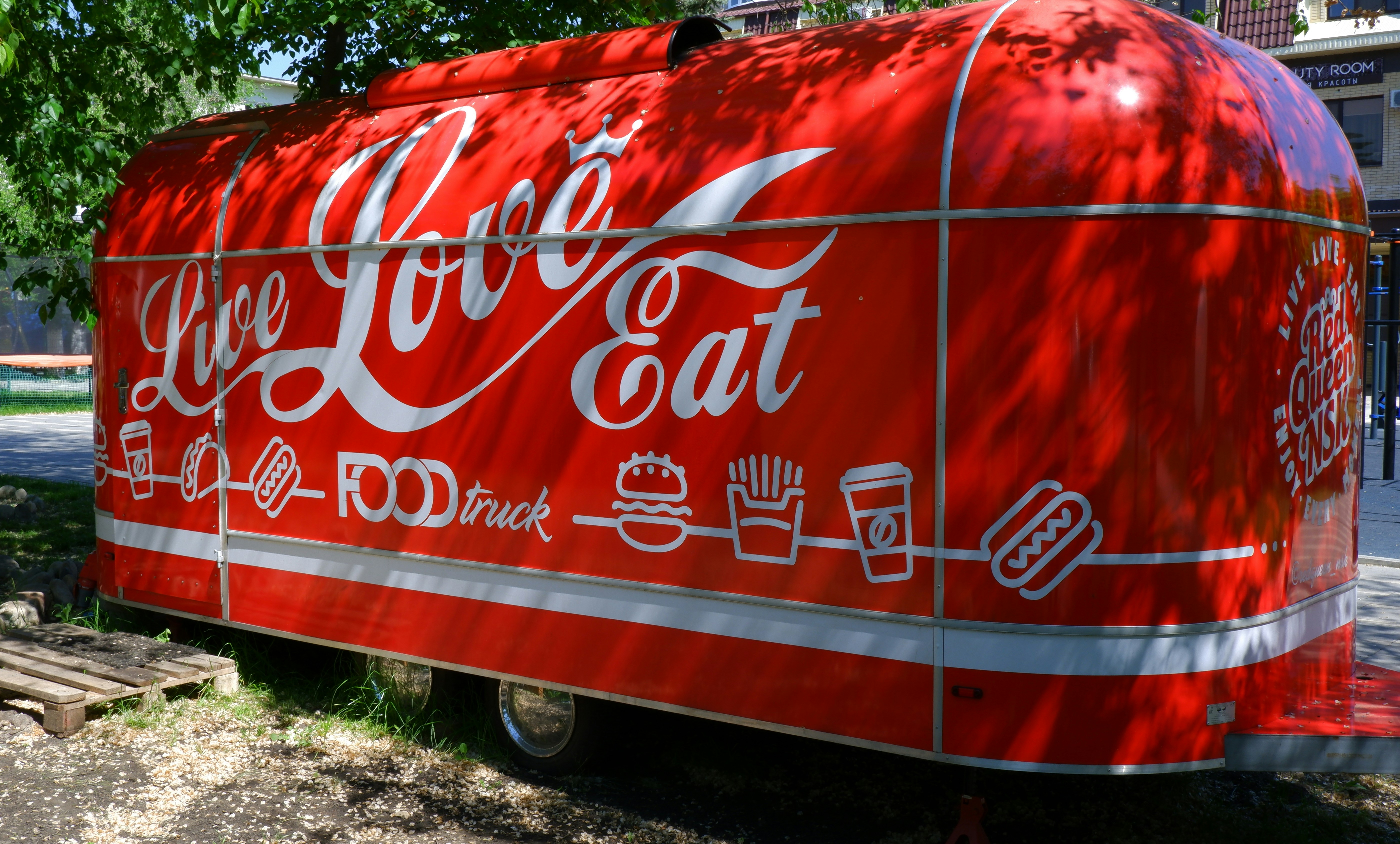 a red container with white text on it