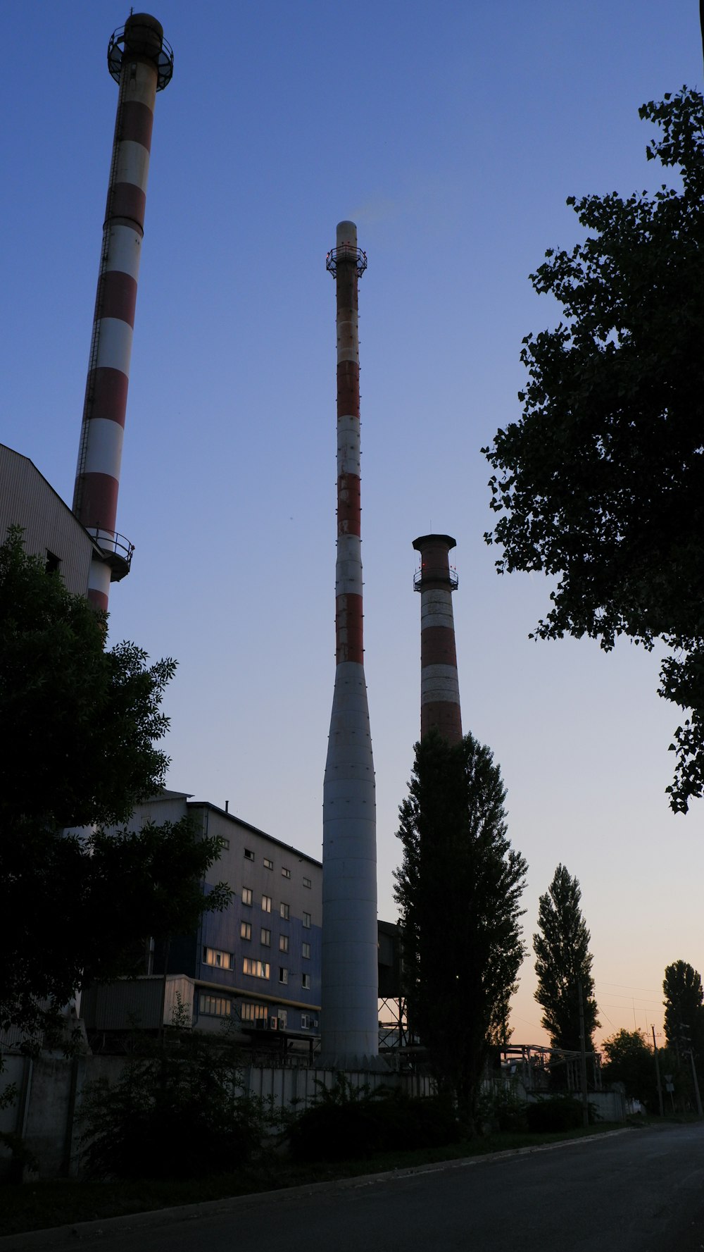 a tall tower with a cylindrical top