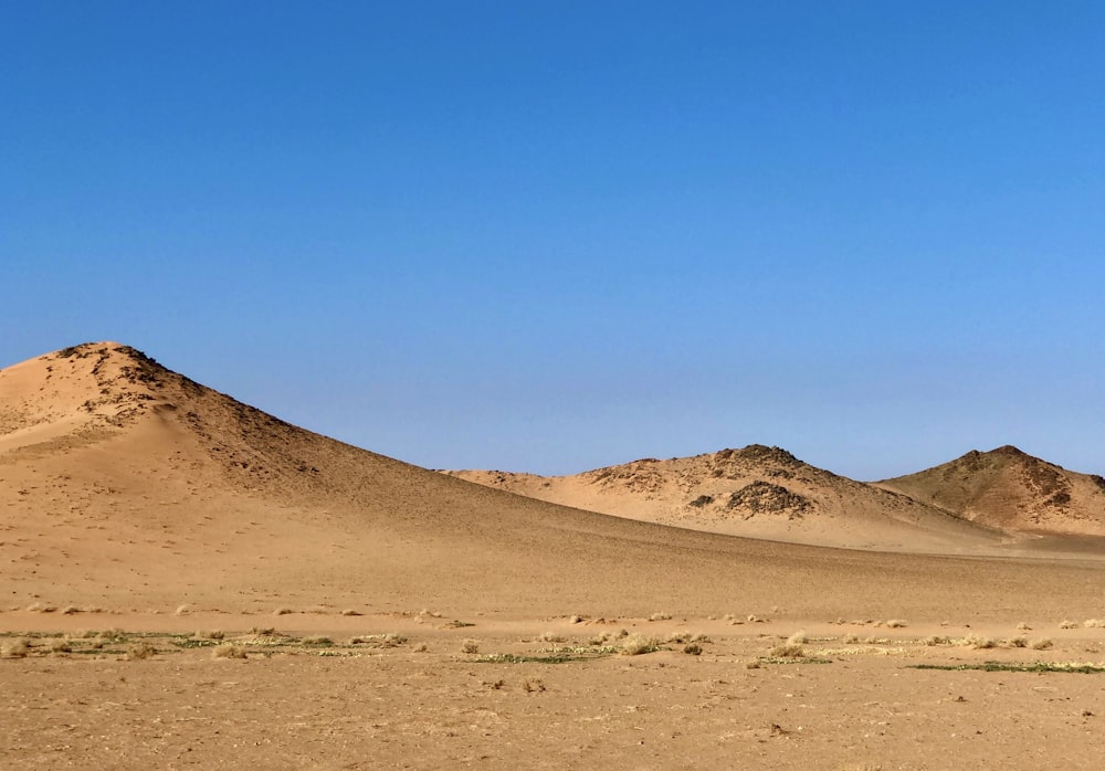 a desert landscape with hills