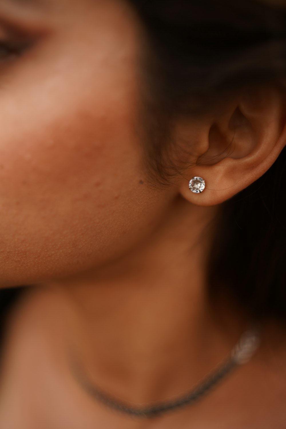 a close up of a woman's ear