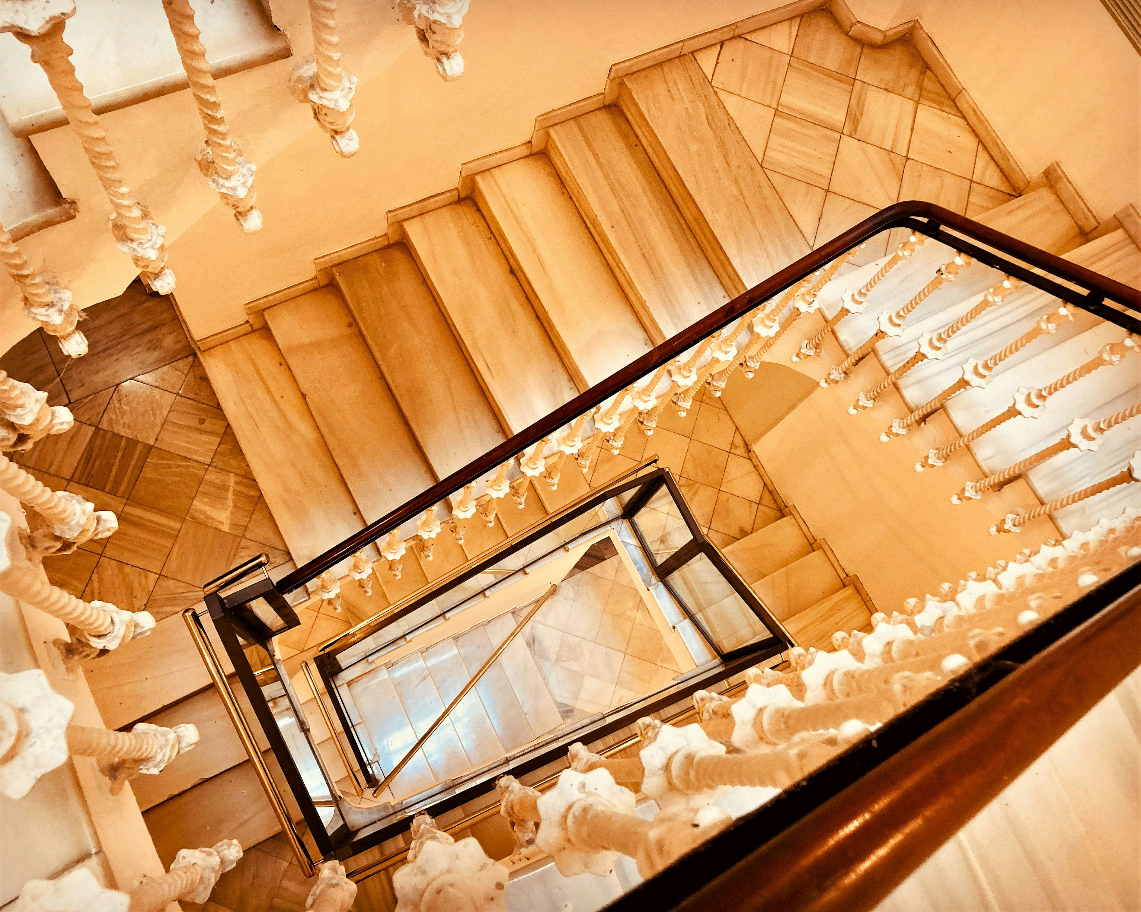 a staircase with a mirror, Luxury hotel staircase