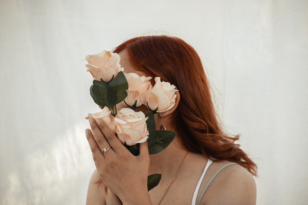 a woman holding flowers