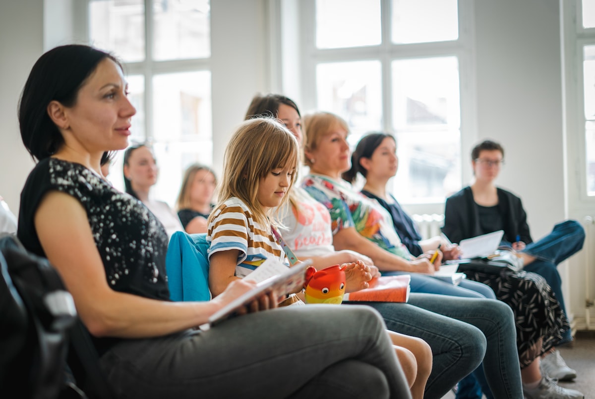 Teacher meeting with parents, a scenario AI parent communication tools for teachers in 2026 help support