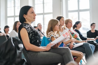 a group of people sitting in a room