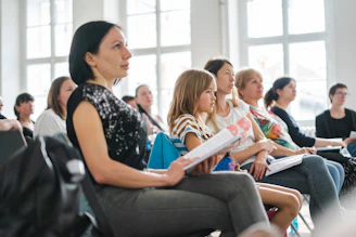 a group of people sitting in a room