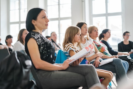 a group of people sitting in a room