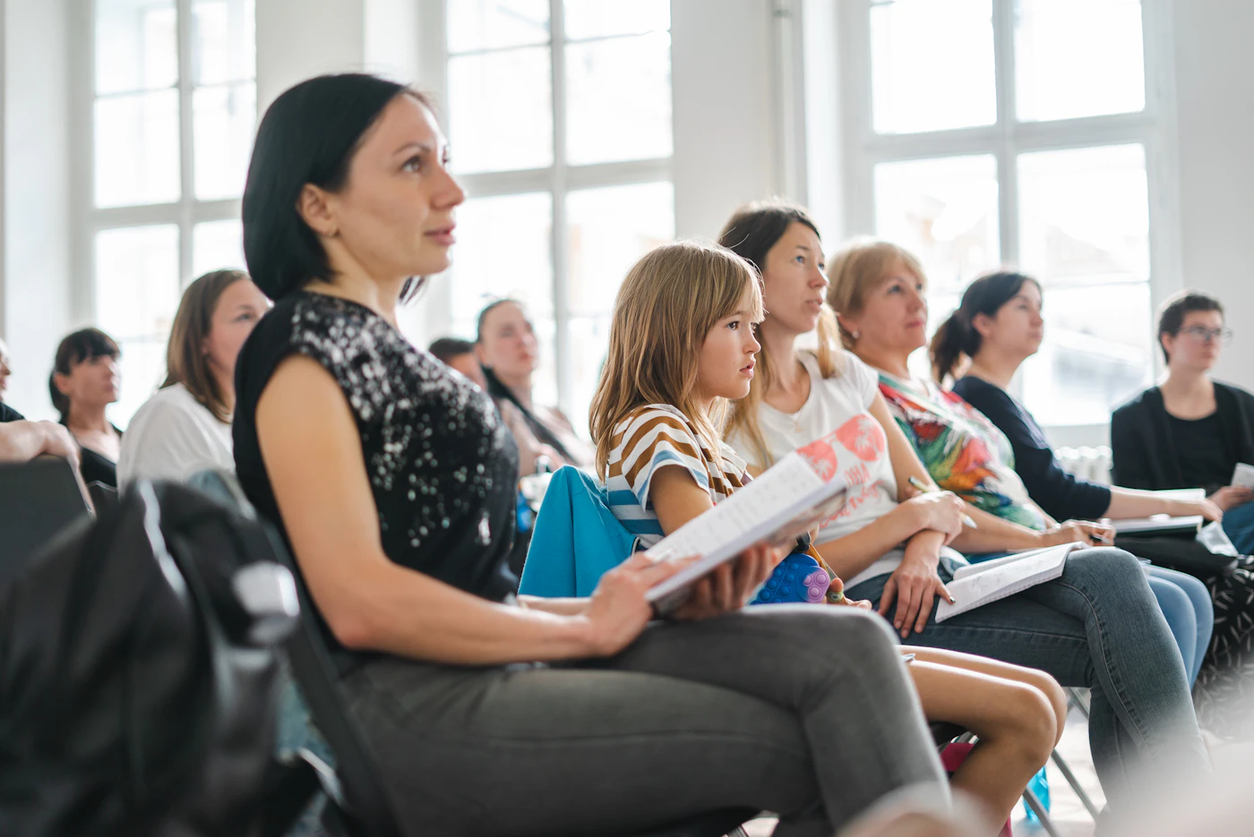 Group seated for a speaking workshop