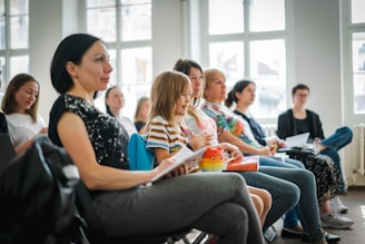 a group of people sitting in a room