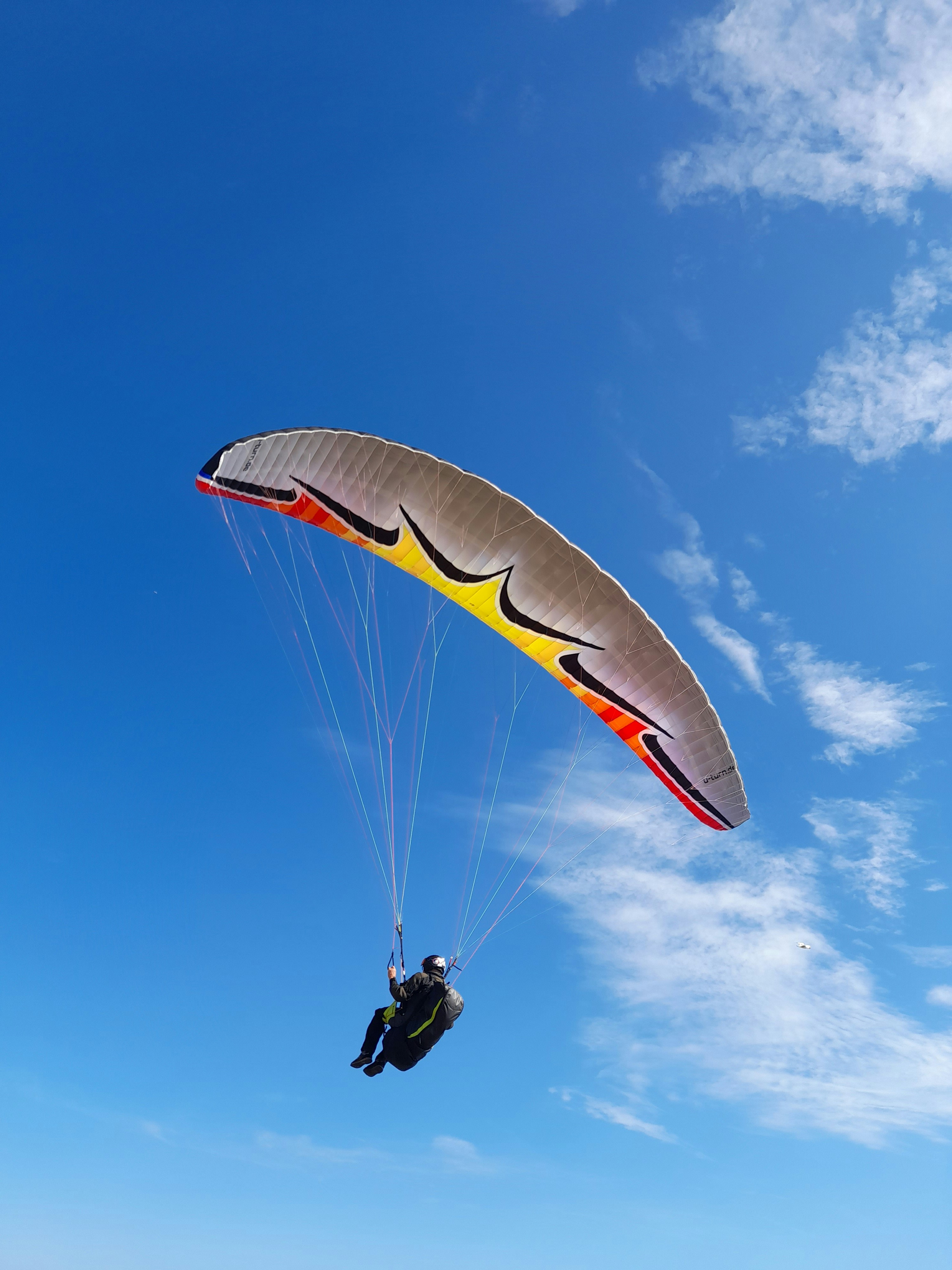 a person parachuting in the air