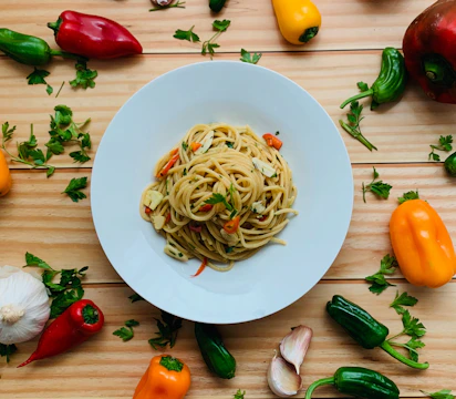a plate of pasta and vegetables