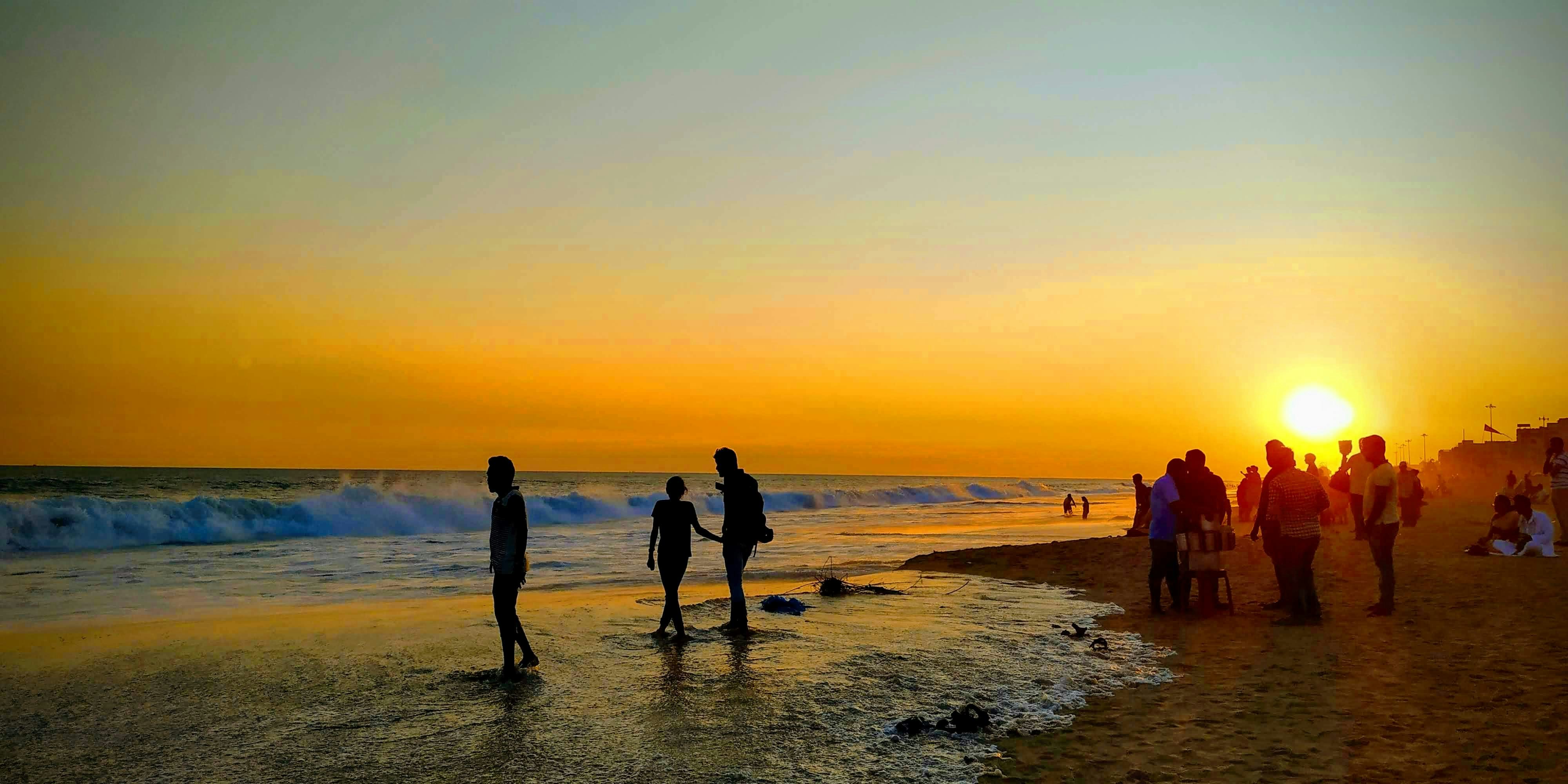 a group of people on a beach