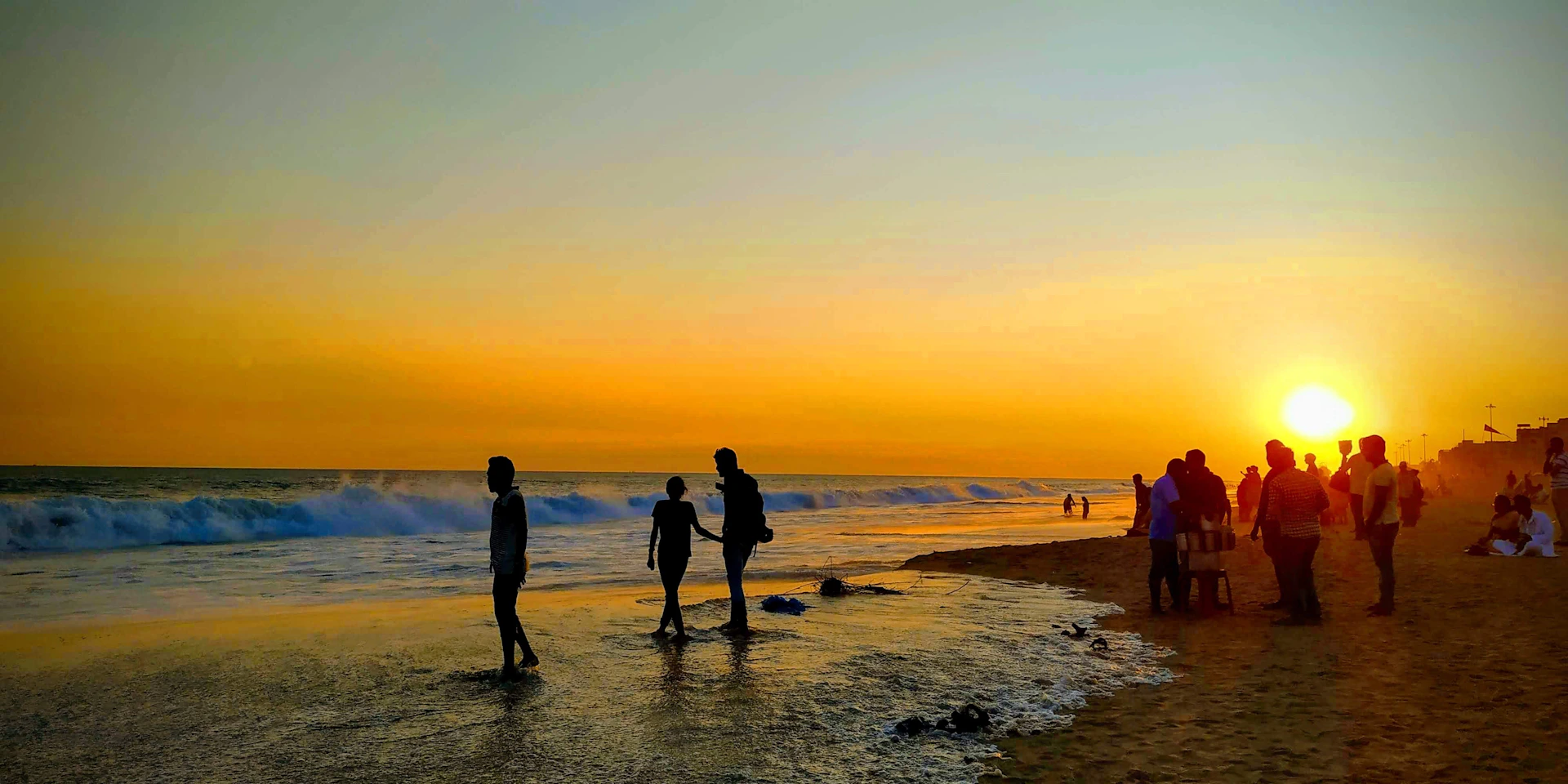 a group of people on a beach