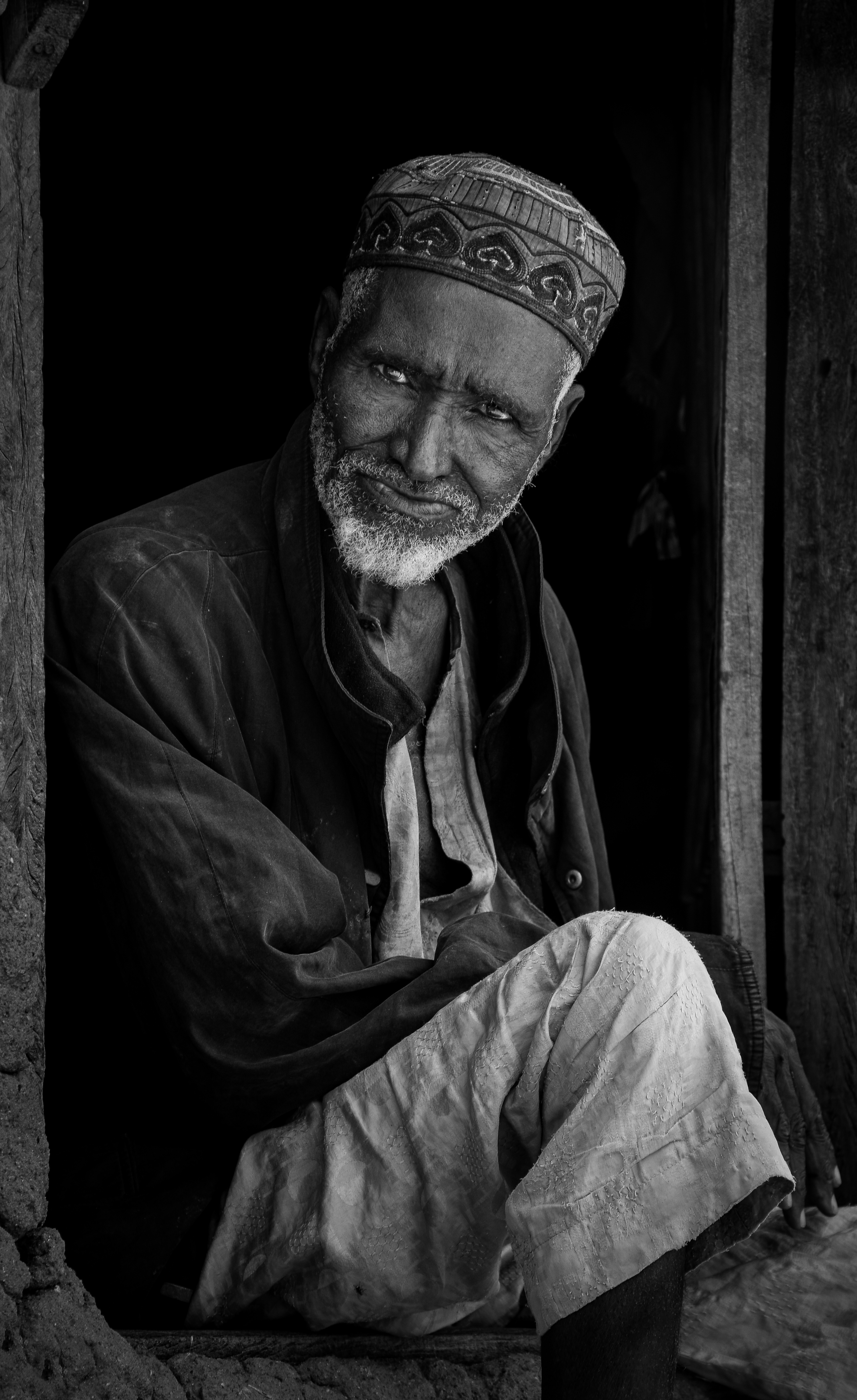 a man wearing a head scarf