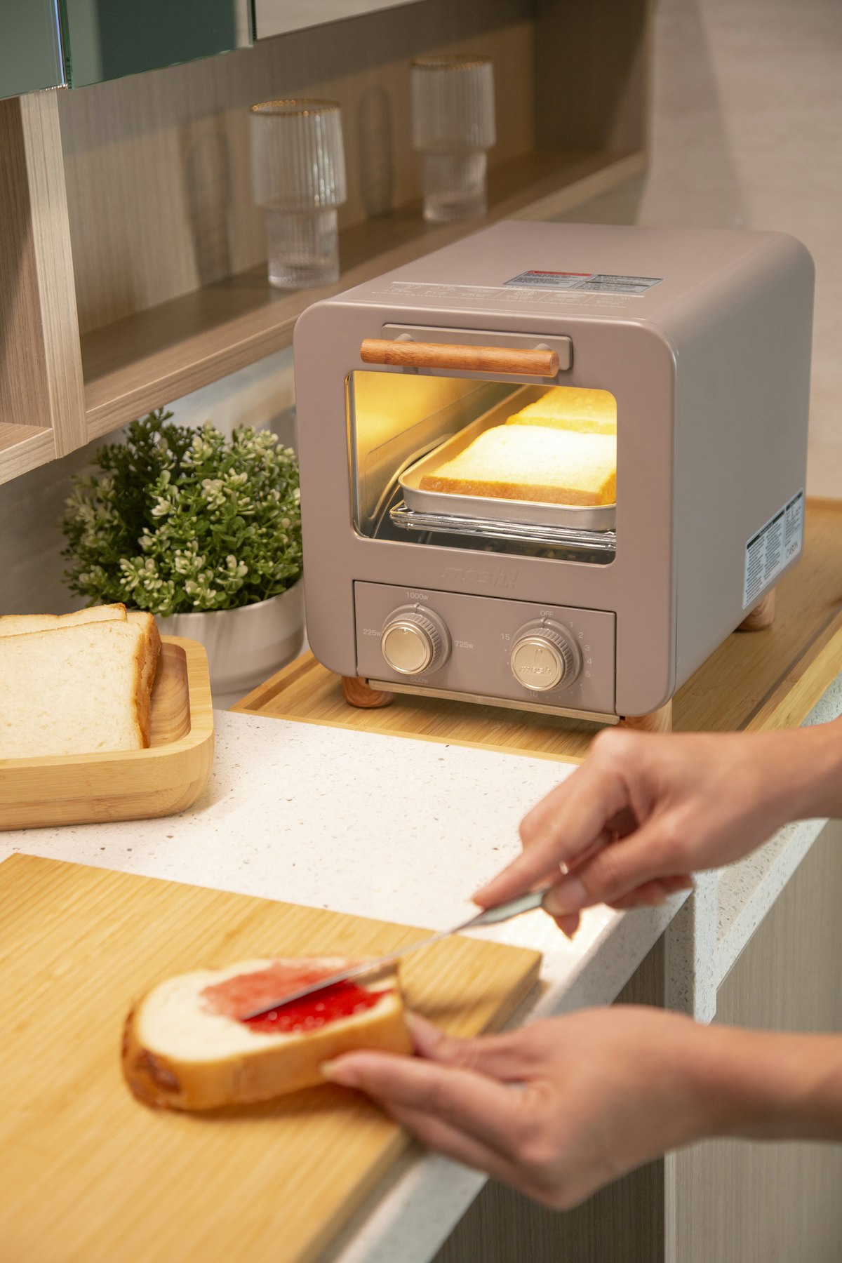 Person making toast in the morning